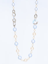 Necklace with round pendants and pearls